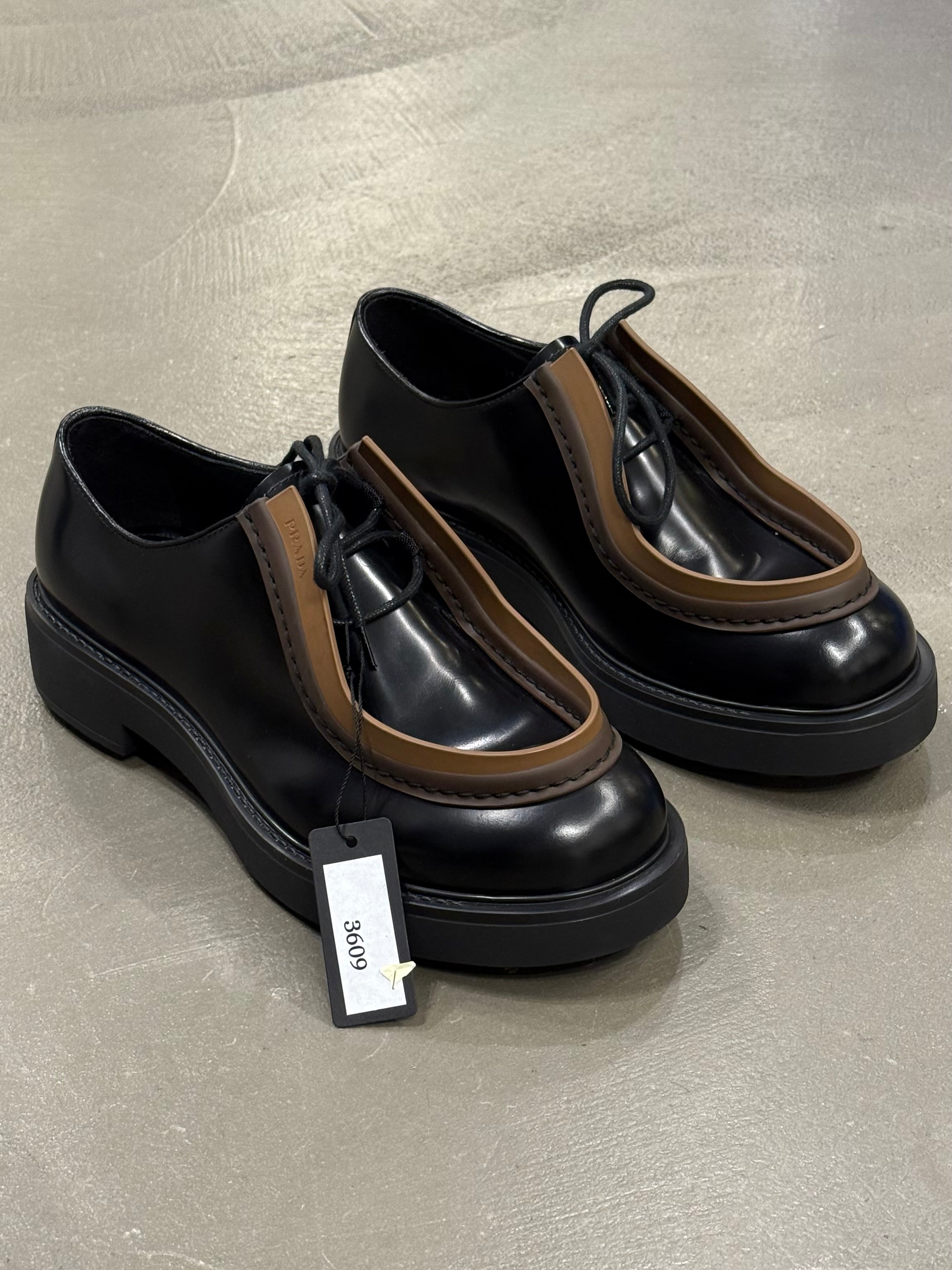 2023 Prada Diapason opaque runway derby shoes