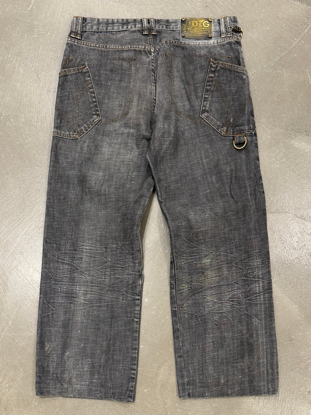 2003 Dolce & Gabbana asymmetrical heavy faded jeans