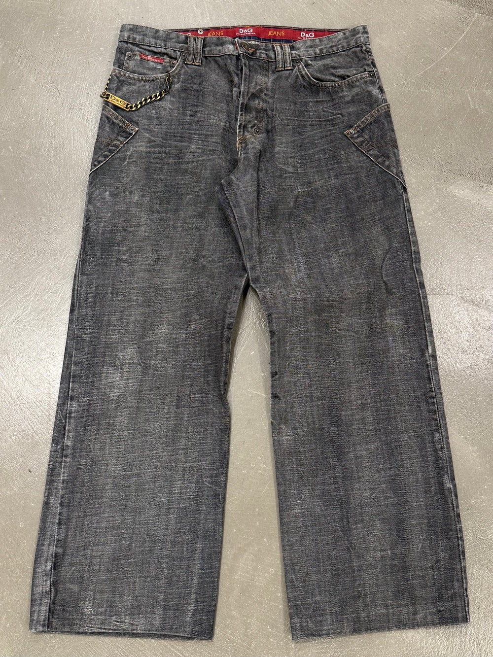 2003 Dolce & Gabbana asymmetrical heavy faded jeans