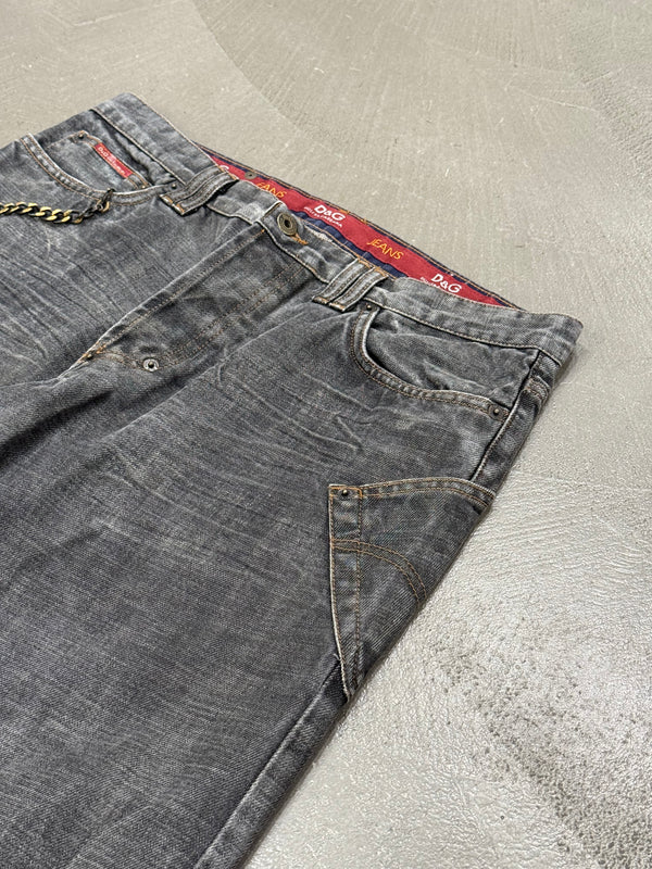 2003 Dolce & Gabbana asymmetrical heavy faded jeans
