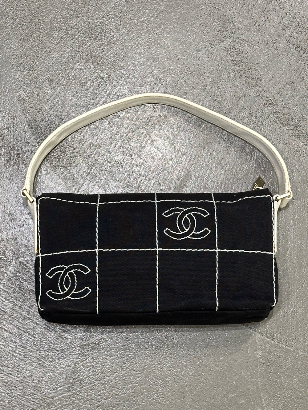2003–2004 Chanel canvas chocolate bar bag.