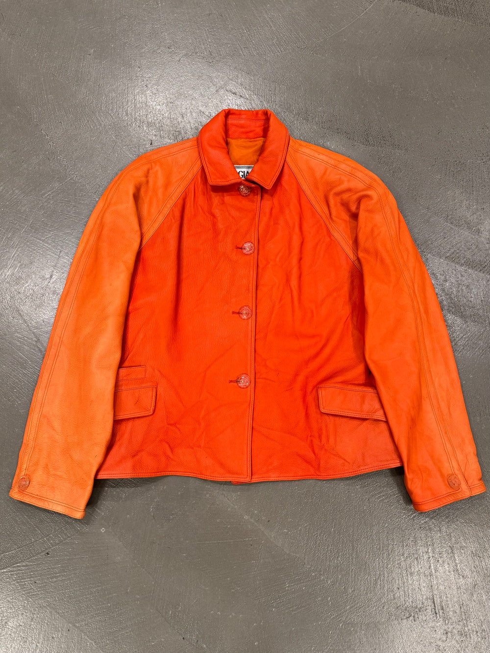 1980s Gianni Versace orange leather jacket