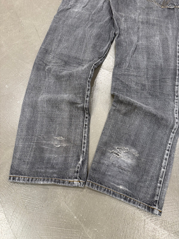 A/W2003 Dolce & Gabbana asymmetrical faded baggy jeans