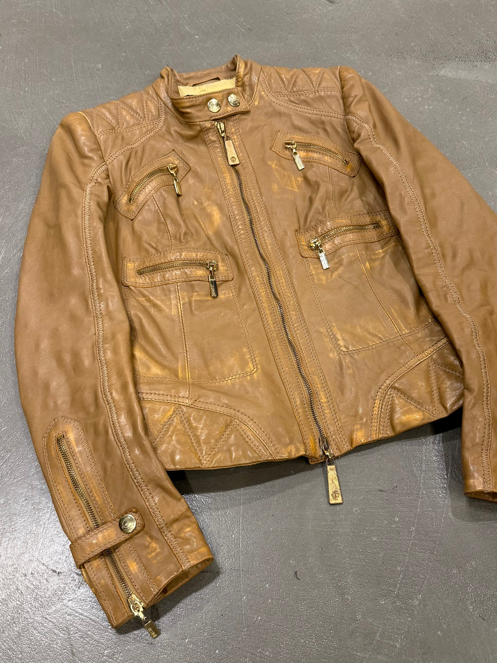 2000s Roberto Cavalli leather jacket with golden accents
