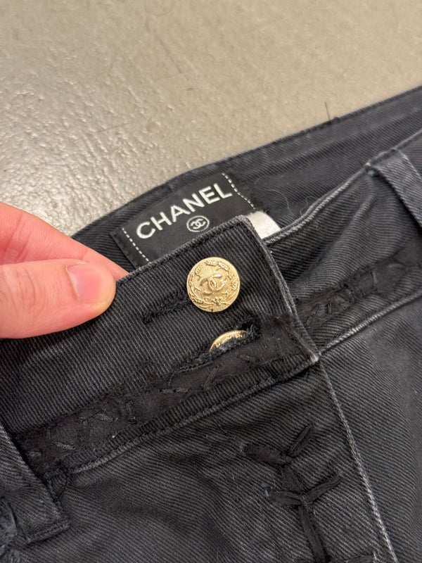 2000s Chanel black distressed patchwork jeans
