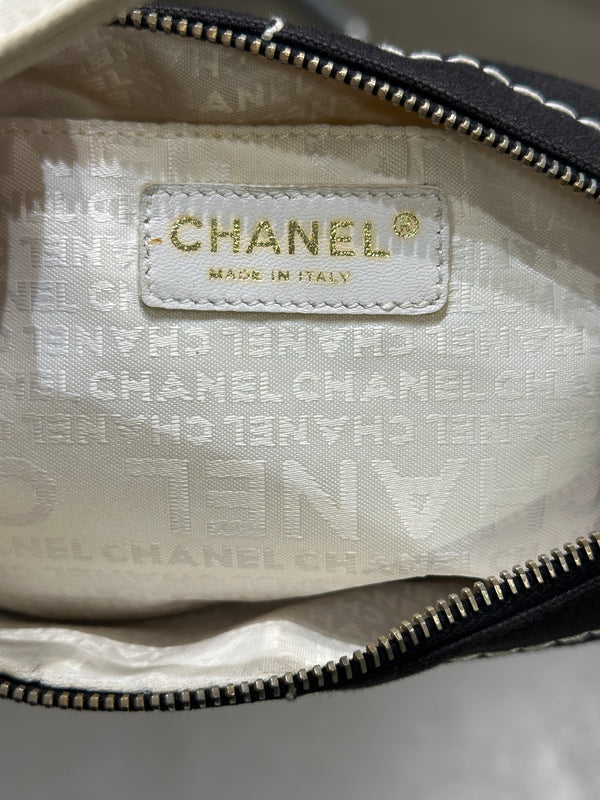 2003–2004 Chanel canvas chocolate bar bag.