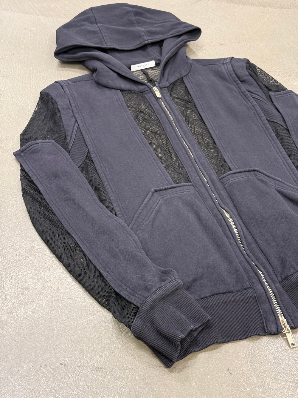 2010s Givenchy by Riccardo Tisci paneled mesh hoodie