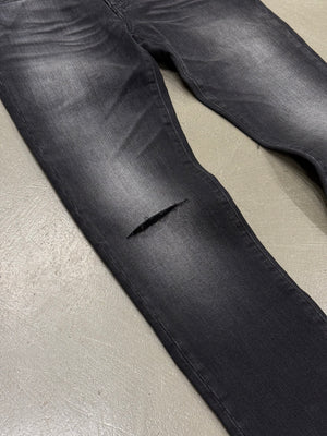 2018 Saint Laurent “D02” faded distressed black pants