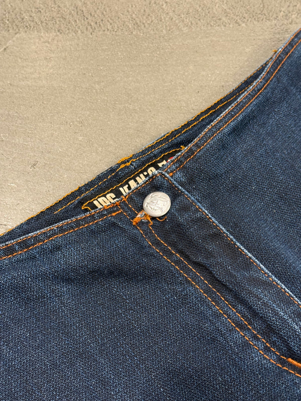 2000s Jean Paul Gaultier pierced patchwork flared jeans