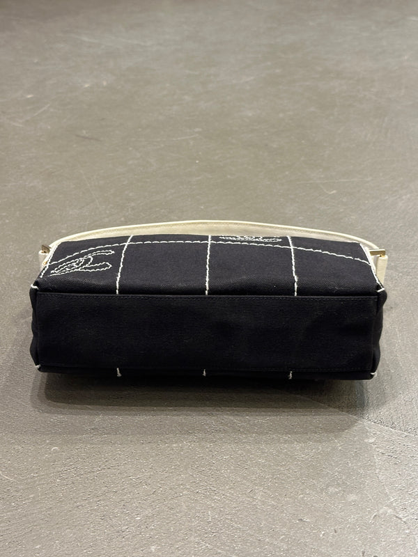 2003–2004 Chanel canvas chocolate bar bag.