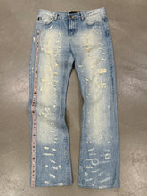 Load image into Gallery viewer, 2000s Roberto Cavalli distressed jeans
