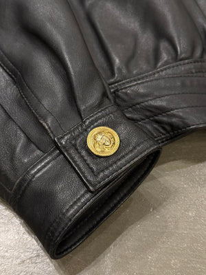 1990s Gianni Versace leather jacket with gold studs details