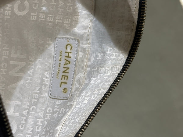 2003–2004 Chanel canvas chocolate bar bag.