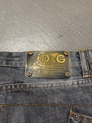 2003 Dolce & Gabbana asymmetrical heavy faded jeans