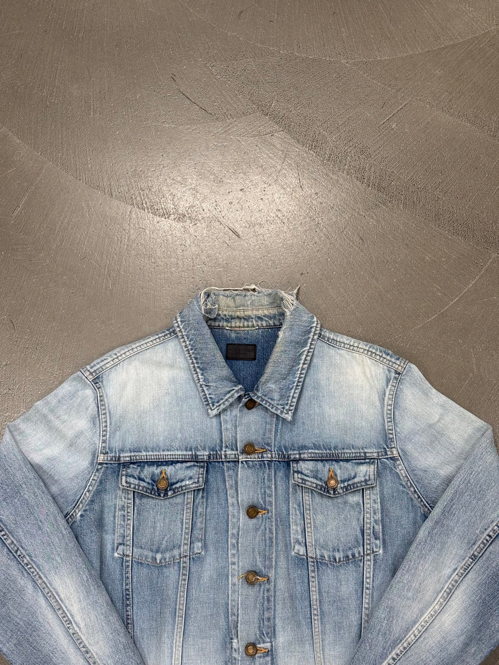 2020 Saint Laurent light wash distressed denim trucker jacket