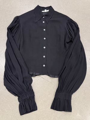 1990s Dolce & Gabbana black silk blouse with sheer sleeve