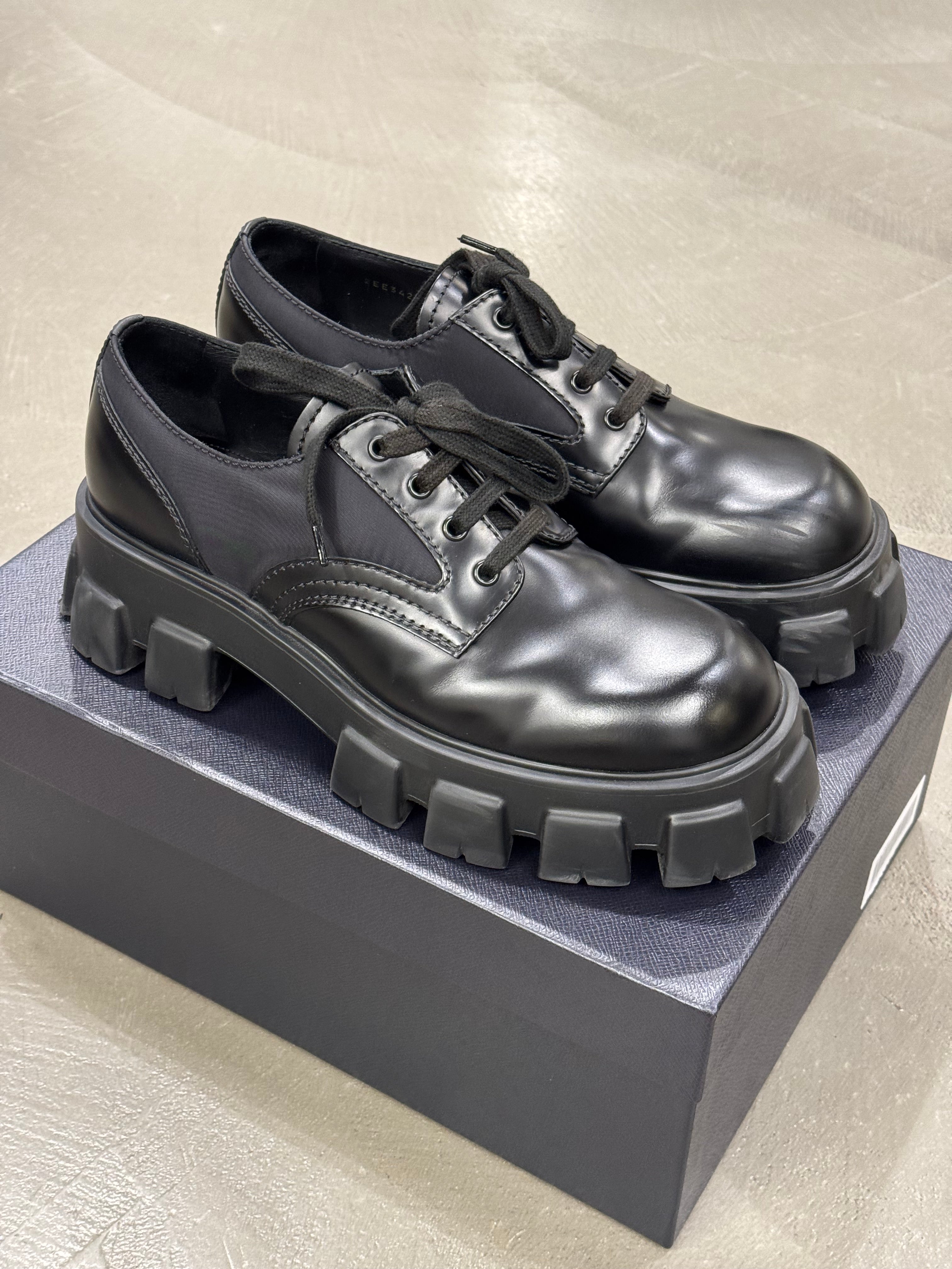 2023 Prada monolith leather/Nylon derby shoes