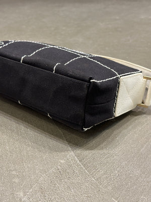 2003–2004 Chanel canvas chocolate bar bag.