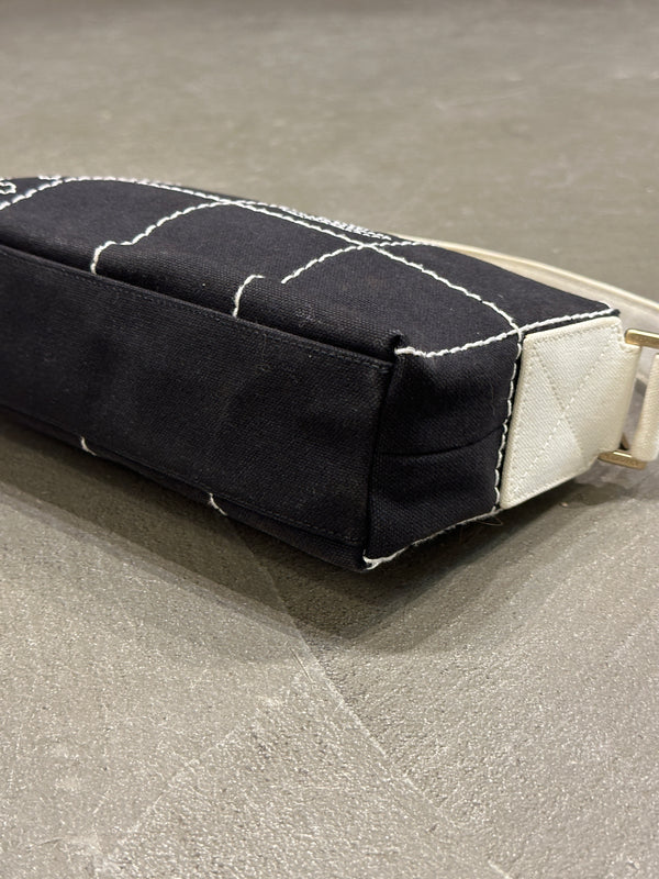 2003–2004 Chanel canvas chocolate bar bag.