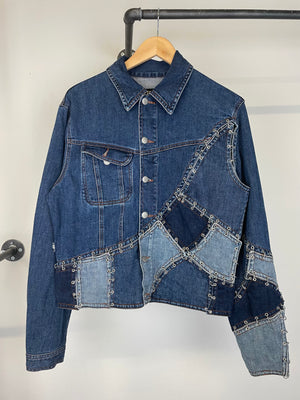SS2003 Jean Paul Gaultier pierced patchwork reconstructed denim jacket