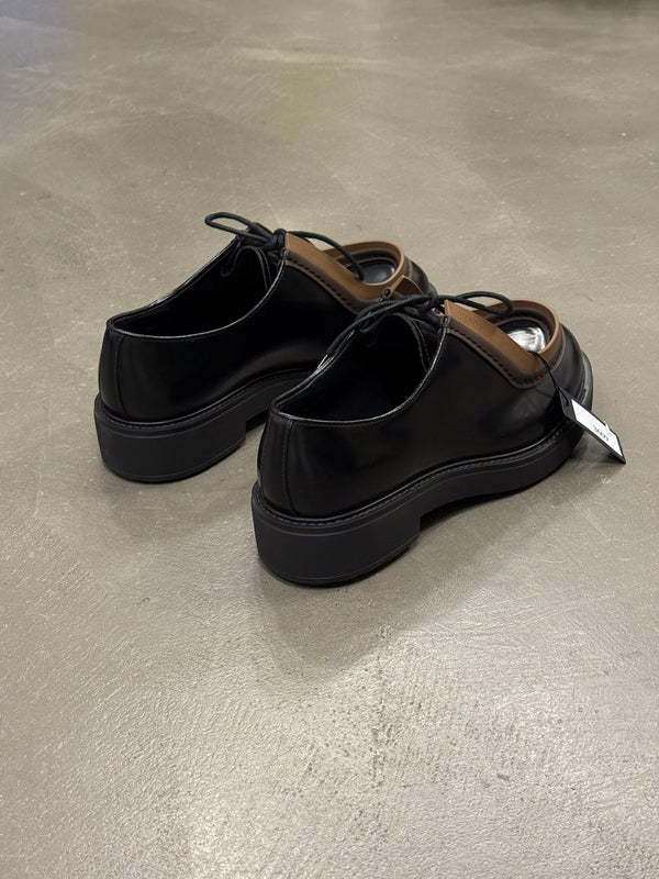2023 Prada Diapason opaque runway derby shoes