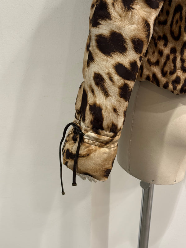 2000s Roberto Cavalli leopard print silk puffer jacket with leather straps
