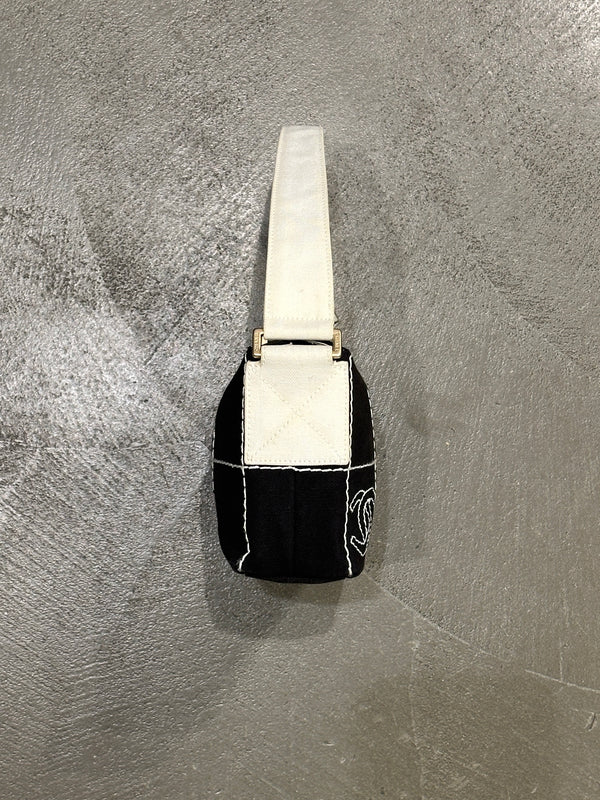 2003–2004 Chanel canvas chocolate bar bag.