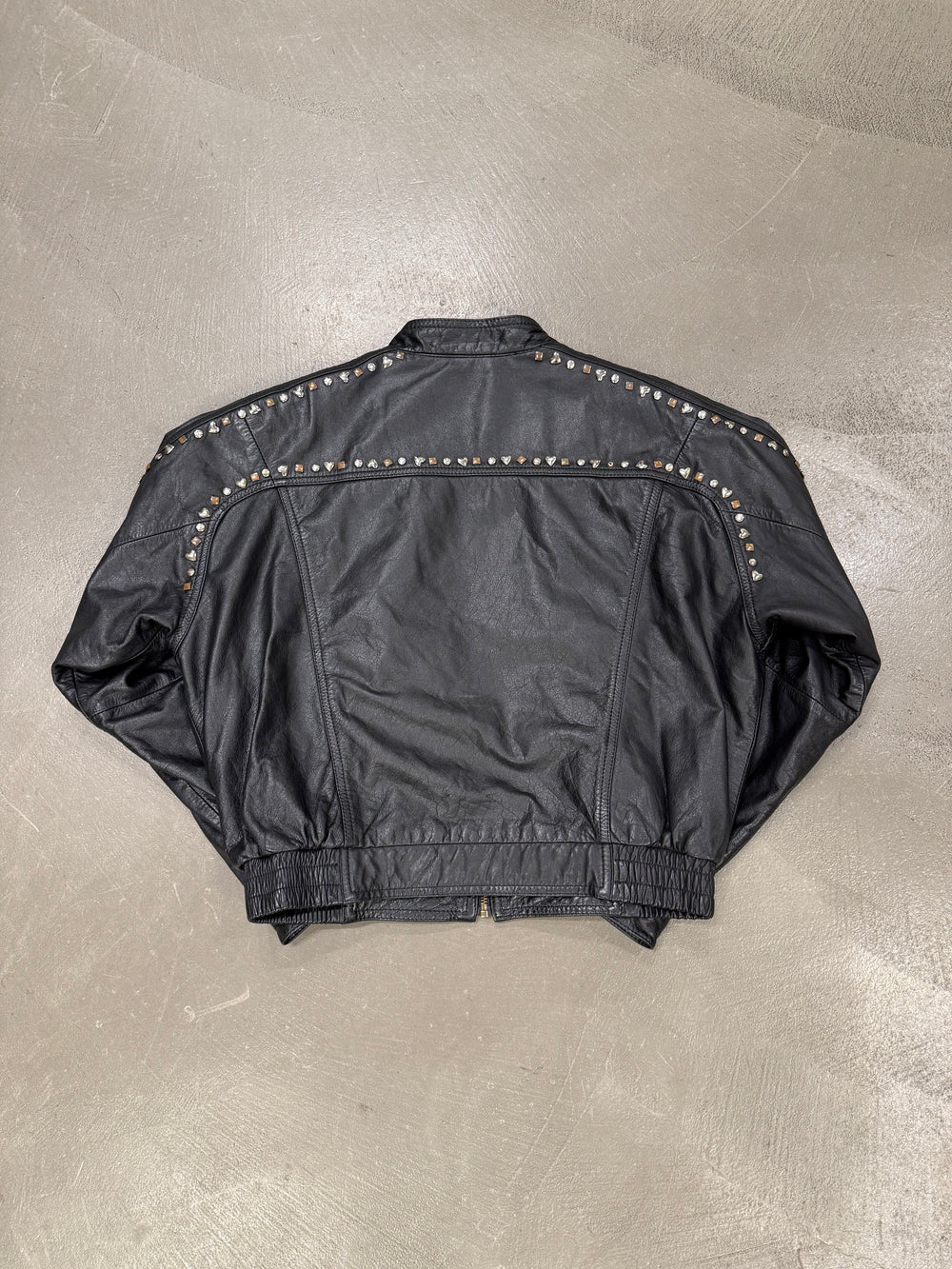 1990s Gianni Versace "Playboy" studded leather bomber jacket