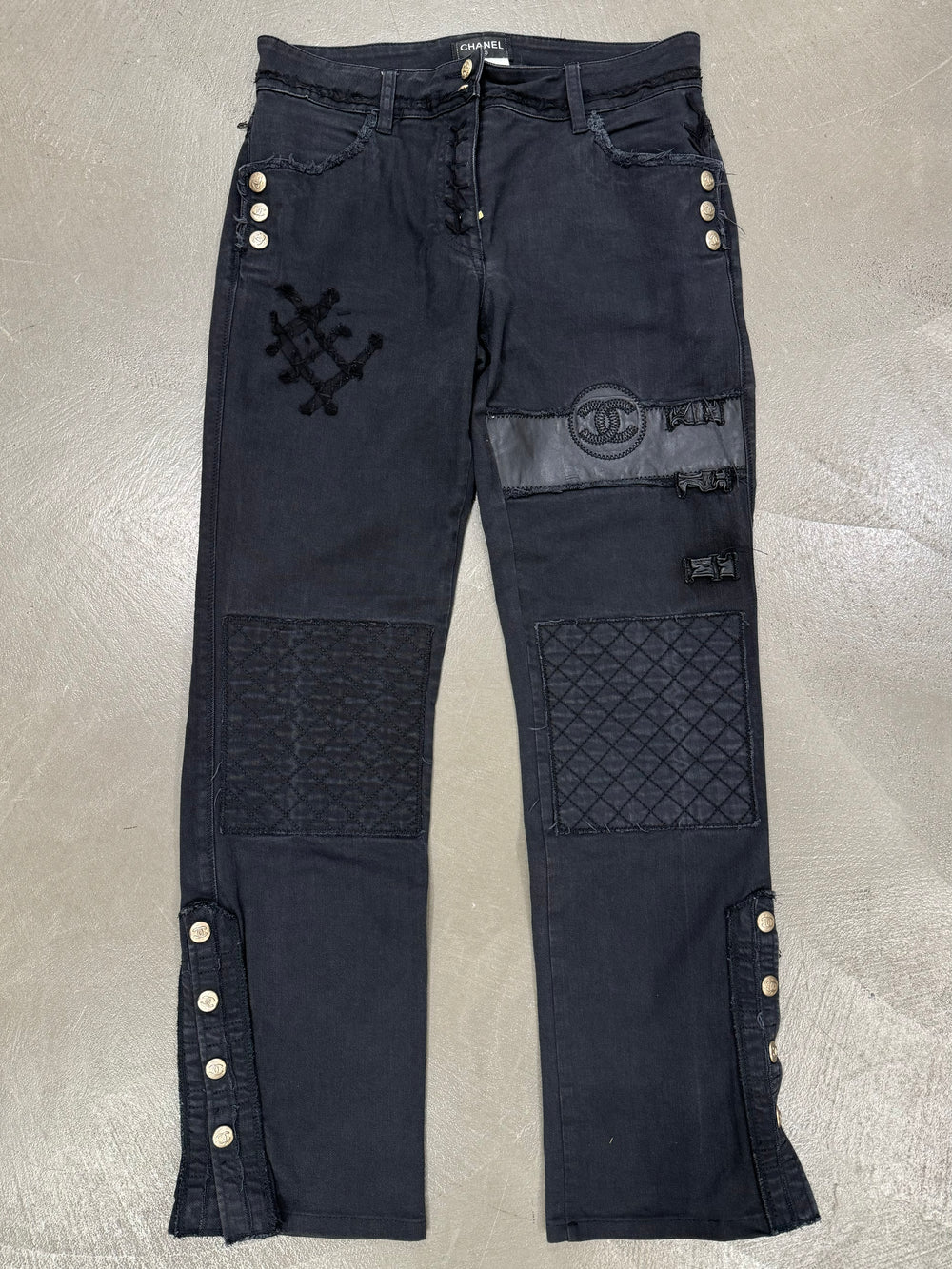 2000s Chanel black distressed patchwork jeans