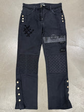 Load image into Gallery viewer, 2000s Chanel black distressed patchwork jeans
