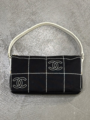 2003–2004 Chanel canvas chocolate bar bag.