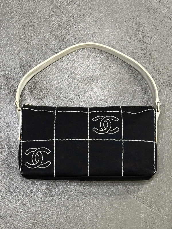 2003–2004 Chanel canvas chocolate bar bag.