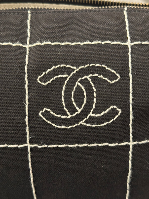 2003–2004 Chanel canvas chocolate bar bag.