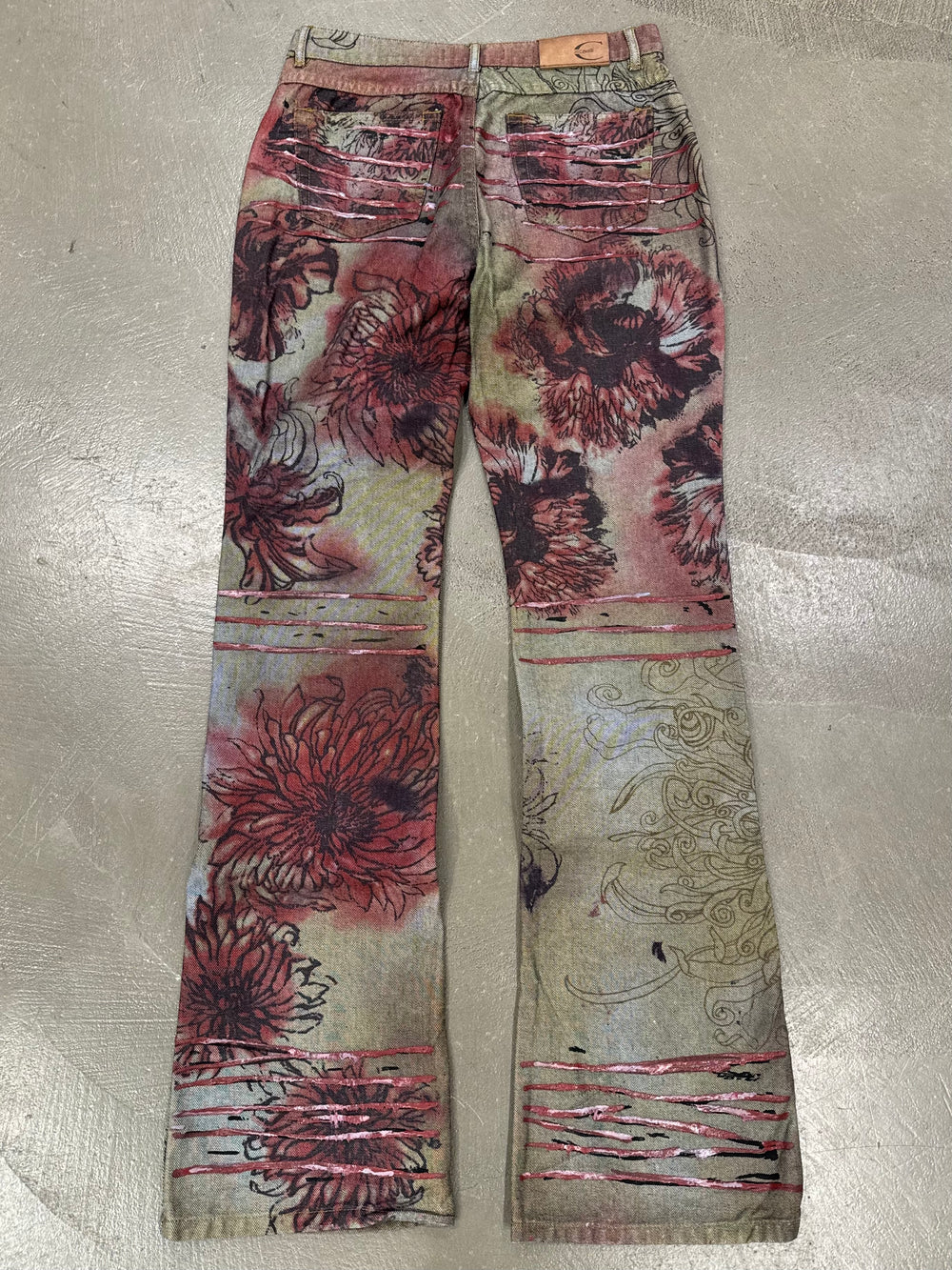 2001 Cavalli paint stripes floral tattoo jeans