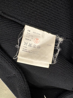 A/W2002 Comme des Garçons twisted asymmetrical runway jacket
