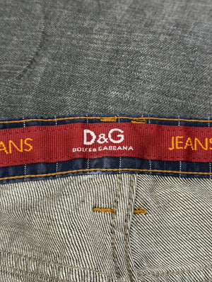2003 Dolce & Gabbana asymmetrical heavy faded jeans