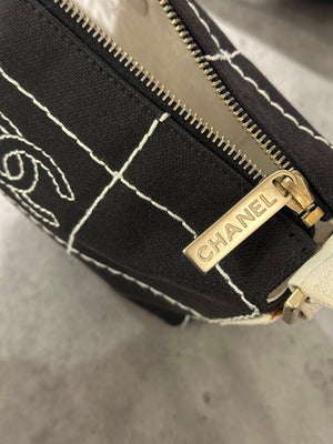 2003–2004 Chanel canvas chocolate bar bag.