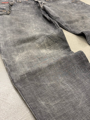 2003 Dolce & Gabbana asymmetrical heavy denim with chain