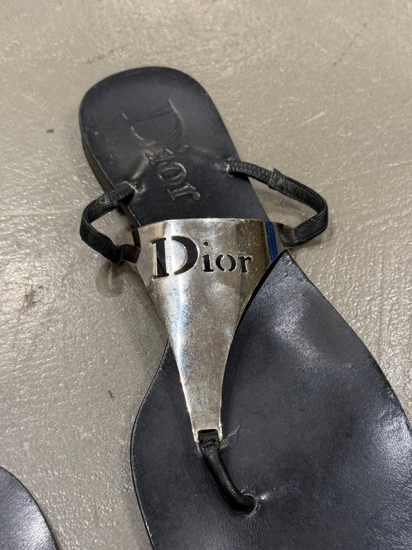 2000s Dior by John Galliano leather flip-flops with metallic plaque