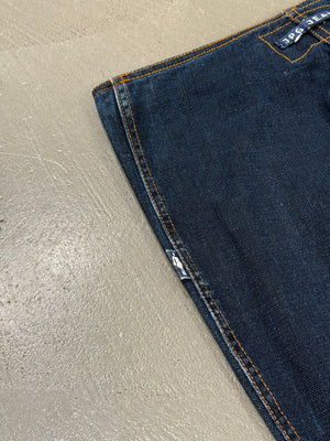 2000s Jean Paul Gaultier pierced patchwork flared jeans
