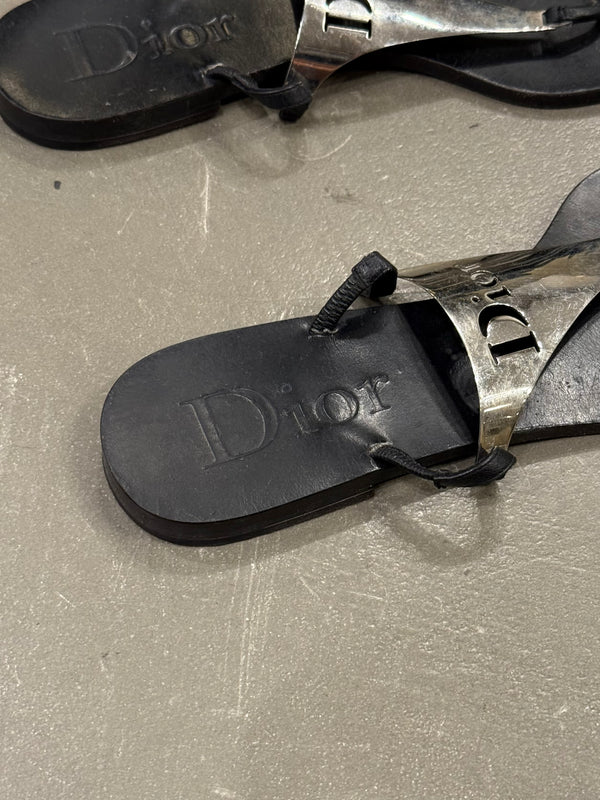 2000s Dior by John Galliano leather flip-flops with metallic plaque