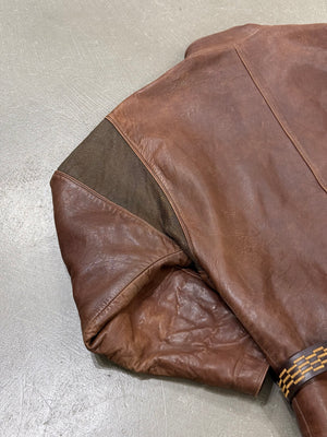 1980s Gianni Versace metallic chainmail belted leather jacket