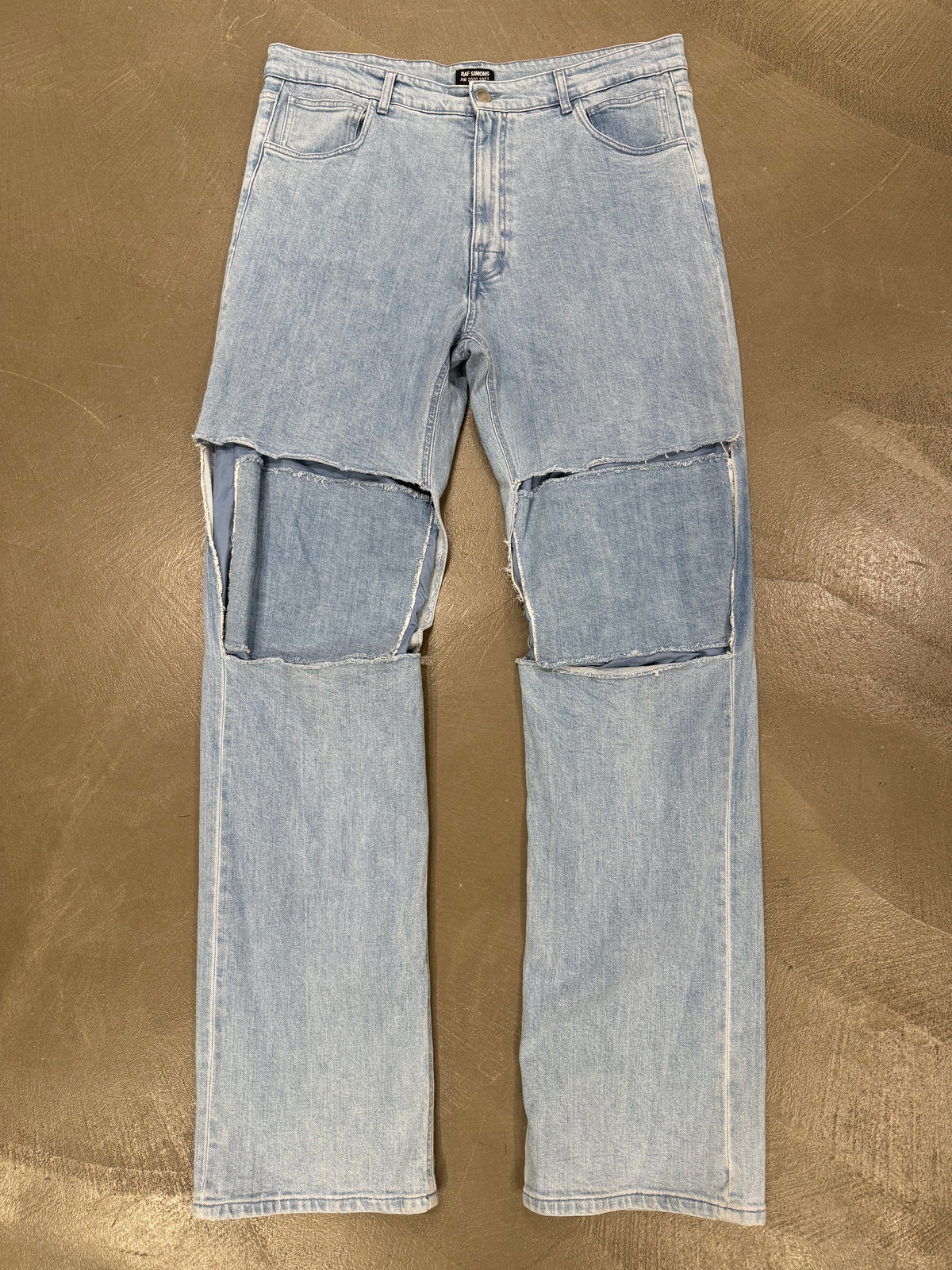 F/W 2020-2021 Raf Simons cut-out baggy jeans