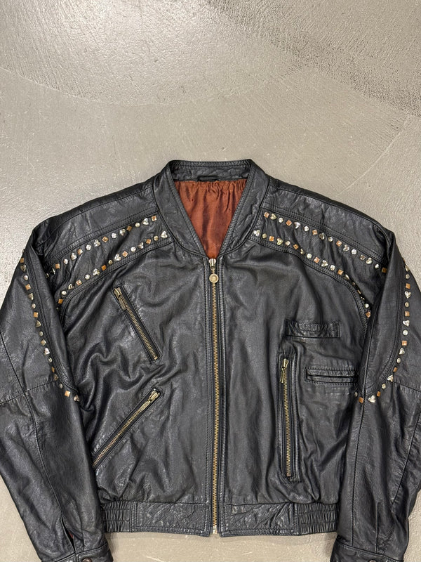 1990s Gianni Versace "Playboy" studded leather bomber jacket