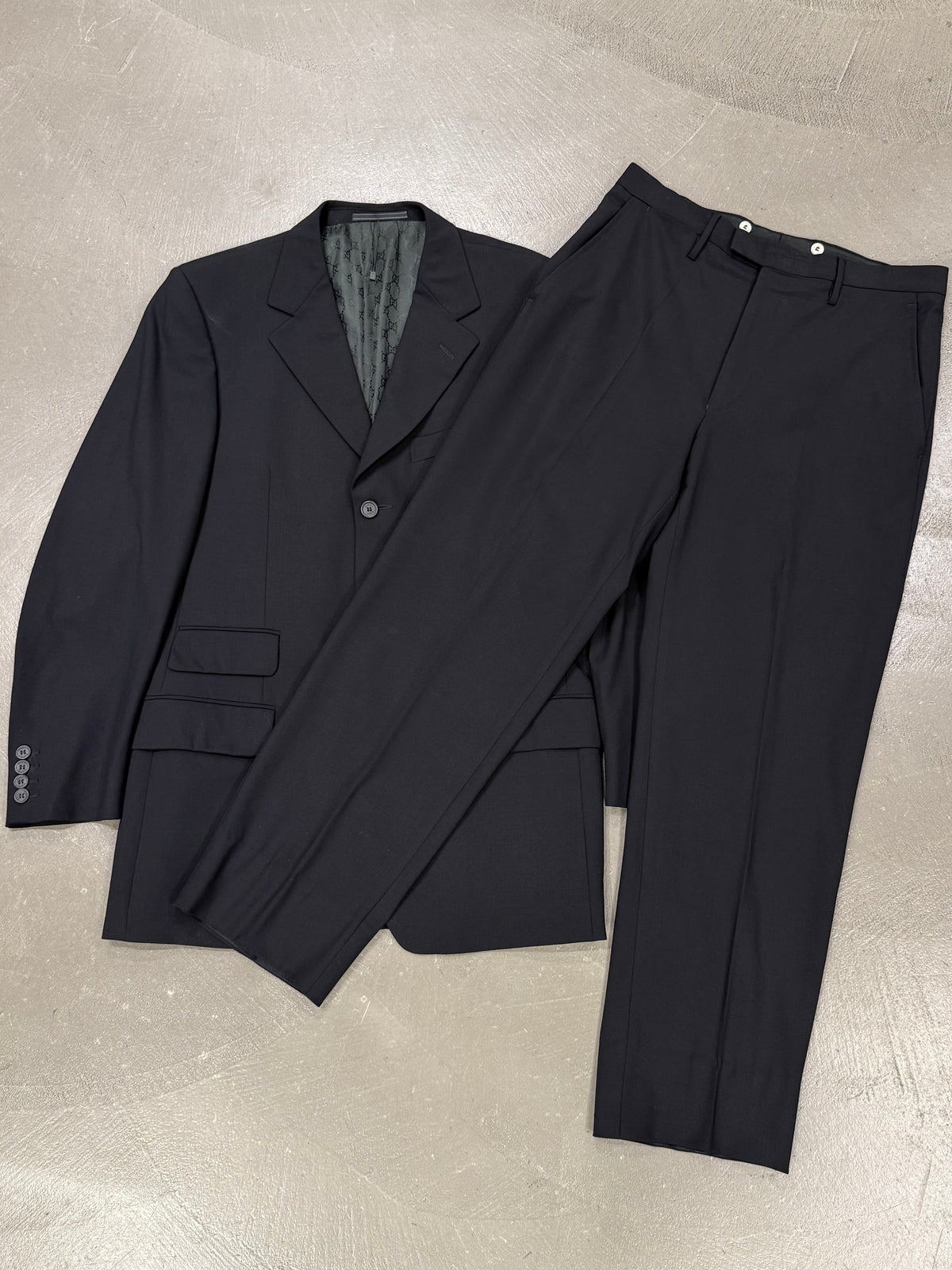 1990s Gucci by Tom Ford black wool suit with monogram lining