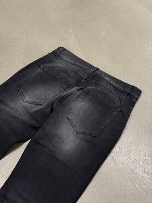 2018 Saint Laurent “D02” faded distressed black pants