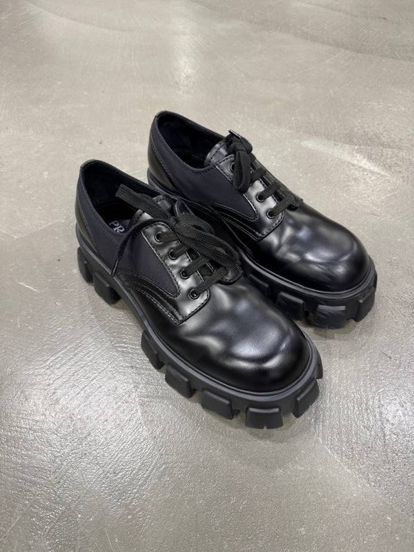2023 Prada monolith leather/Nylon derby shoes