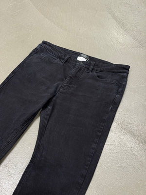 2000s Chanel black uniform slim jeans