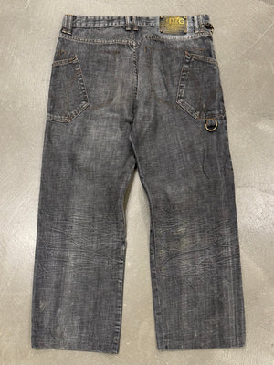 2003 Dolce & Gabbana asymmetrical heavy faded jeans