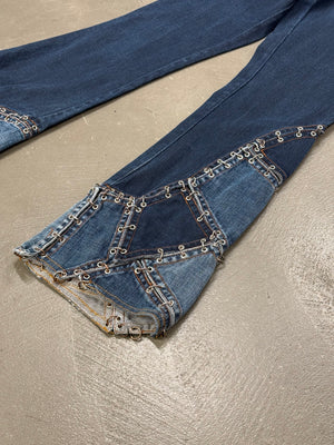 2000s Jean Paul Gaultier pierced patchwork flared jeans
